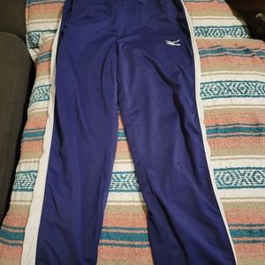 Mizuno warmup pants. Purple with white strip on sides.